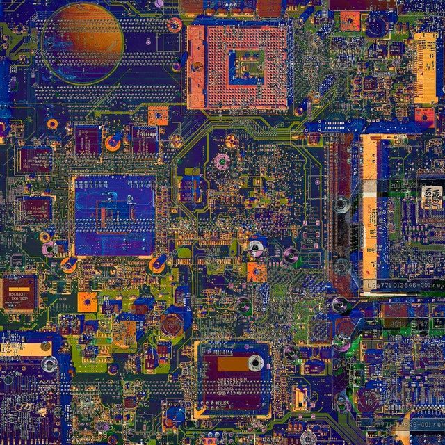 Colorful Circuit Cities Built From Motherboards, Processors, and Microchips